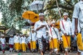 BALI, INDONESIA - SEPTEMBER 25, 2018: Balinese men in traditional clothes on a big ceremony in Tirta Empul Temple.