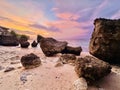 Bali\'s Radiant Sunset: Ocean View with Vibrant Skies and Rocky Silhouettes