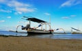 Bali Sanur Indonesia: Traditional Boat fishermen with blue sky and blue water can use for print, image news, etc Royalty Free Stock Photo