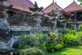 Bali temple entrance with many old statues Royalty Free Stock Photo