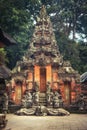 Bali Ubud monkey forest sacred temple Pura Dalem Agung Padangtegal with dragons as travel tropical lifestyle background in toned v