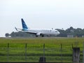 Balikpapan, Indonesia - April 2, 2021 : A Boeing 737 operated by Garuda Indonesia just landed on Sepinggan Airport BPN