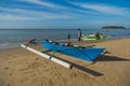 some people doing morning activities on the calm side of Seraya beach Royalty Free Stock Photo