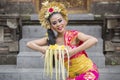 Balinese dancer dancing with frangipani flowers Royalty Free Stock Photo