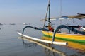 Balinese Fishing Boat Heading Out To Sea at dawn Royalty Free Stock Photo