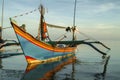 Balinese Fishing Boats Anchored in the Village of Pemuteran. Royalty Free Stock Photo