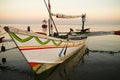 Balinese Fishing Boats Anchored in the Village of Pemuteran. Royalty Free Stock Photo