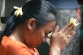 Balinese girl praying - close up