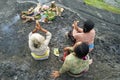 Balinese Hindu devotees pray at sunset.