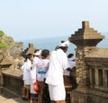 Balinese hindu people dressed in traditional dresses for pray