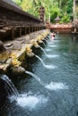 Balinese holy springs in Tirta Empul temple Royalty Free Stock Photo