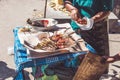 Balinese indonesian street food chicken sate. Preparing chicken sate. Bali island. Royalty Free Stock Photo