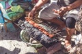 Balinese indonesian street food chicken sate. Preparing chicken sate. Bali island. Royalty Free Stock Photo