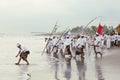 Balinese men during the annual ceremony of purification Melasti Royalty Free Stock Photo