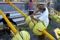 Balinese men preparing Traditional Bali Penjor bamboo pole in Bali Indonesia Royalty Free Stock Photo