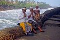 Balinese men by the sea