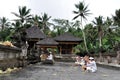 Balinese praying at tampaksiring temple