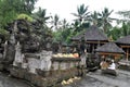 Balinese priest officiating at tampaksiring temple Royalty Free Stock Photo