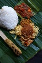 Balinese ready-to-eat street food, packaged in small portions of banana leaves