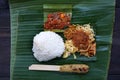 Balinese ready-to-eat street food, packaged in small portions of banana leaves