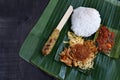 Balinese ready-to-eat street food, packaged in small portions of banana leaves