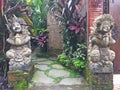 Balinese statues as guardian symbols in front of the gate