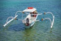 Balinese traditional boat with motor - double outrigger jukung Royalty Free Stock Photo