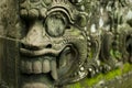 Balinese wall decoration carvings that have been slightly destroyed Royalty Free Stock Photo