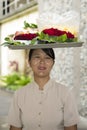 Balinese woman carrying tray on head