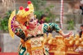 Balinese woman dancing traditional temple dance Legong