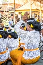 Balinese woman praying on a big traditional ceremony. Bali island.