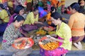 Balinese women preparing Traditional Hindu offering decoration in Bali Indonesia