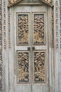 Balinese wood carved doors with traditional local ornaments Royalty Free Stock Photo