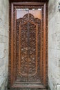 Balinese wood carved doors with traditional local ornaments Royalty Free Stock Photo