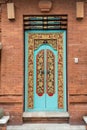 Balinese wood carved doors with traditional local ornaments