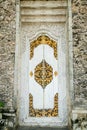 Balinese wood carved doors with traditional local ornaments Royalty Free Stock Photo