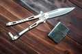 Balisong knife and lighter Royalty Free Stock Photo