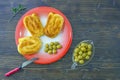 Balkan cuisine. Bureks filled pastry, popular national dish and olives on red plate. Copy space