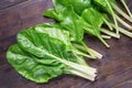 Balkan cuisine. Chard leaves ( blitva ) - leafy vegetables on rustic table Royalty Free Stock Photo