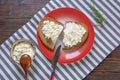 Balkan cuisine. Kaymak - local soft white cheese - on slices of bread. Flat lay, copy space Royalty Free Stock Photo