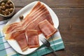 Balkan cuisine . Slices of prsut: dry-cured ham, prosciutto. Copy space