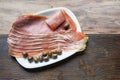 Balkan cuisine . Slices of prsut: dry-cured ham, Balkan version of prosciutto. Copy space