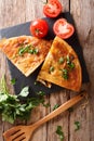 Balkan food: burek with meat close-up on the table. vertical top