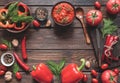 Balkan sauce ajvar and ingredients for its preparation on a wooden table with a copy space. Serbian traditional food Royalty Free Stock Photo