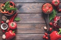 Balkan sauce ajvar and ingredients for its preparation on a wooden table with a copy space. Serbian traditional food Royalty Free Stock Photo