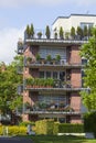 Balconies decorated with potted plants and flower boxes, Wilhelmshaven, Germany