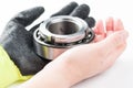Ball bearing and gloves isolated on white background.Copy space Royalty Free Stock Photo