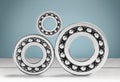 Ball bearings, pinions on background Royalty Free Stock Photo
