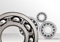 Ball bearings, pinions on background Royalty Free Stock Photo
