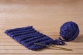 Ball of blue yarn with crochet needle Royalty Free Stock Photo